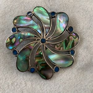 Sterling silver and natural stone pendant/pin.